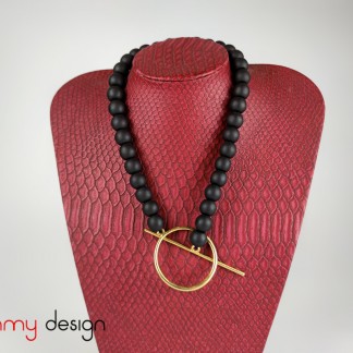 Necklace designed with round metal pendants, black wood beads